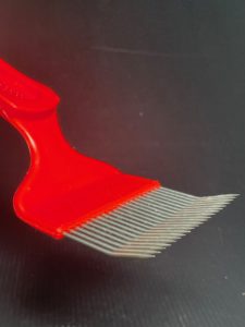 Angled Needle Uncapping Fork